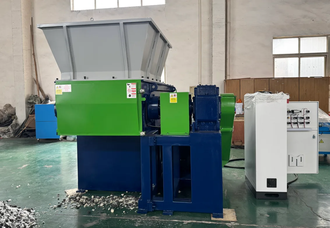 S3 series single shaft shredder with feed hopper and control cabinet, side view